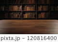 Central view of wooden table with antique bookshelves in a dark brown, shallow depth of field backdrop 120816400