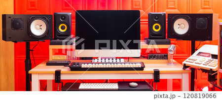 home recording studio concept, desktop computer, two pairs of monitor loudspeakers, midi music keyboard on desk home recording studio concept, desktop computer, two pairs of monitor loudspeakers, midi music keyboard on desk 120819066