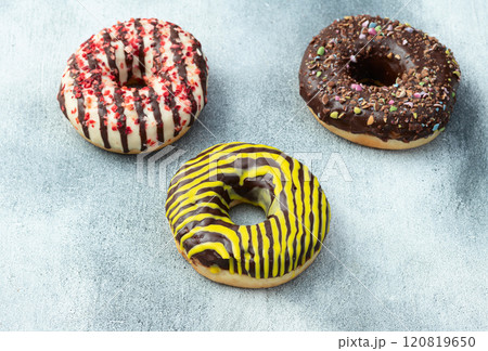 Sweet glazed colorful donuts . Top view Sweet glazed colorful donuts . Top view 120819650