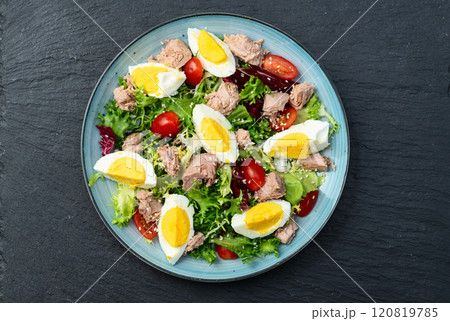 Canned Tuna salad with eggs and tomatoes photography . Top view 120819785