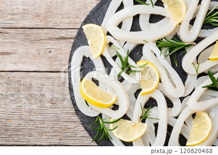 Squid tube and ring photography . Seafood top view 120820488
