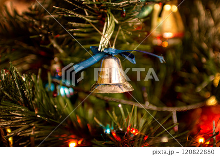 Beautiful festive decorations on the Christmas tree. New Year 2025 Beautiful festive decorations on the Christmas tree. New Year 2025 120822880
