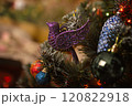 Beautiful festive decorations on the Christmas tree. New Year 2025 120822918