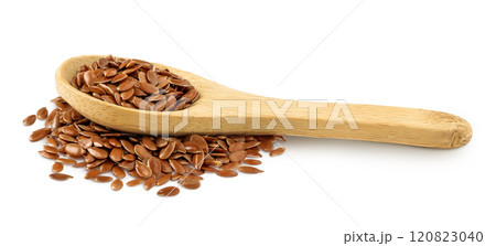 flaxseed in wooden spoon isolated on white background. 120823040