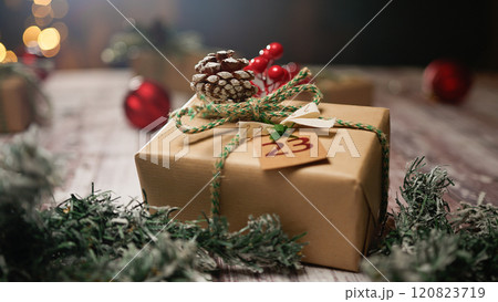 decorated Christmas presents waiting on the table 120823719