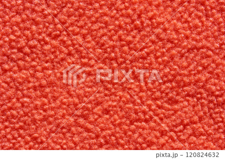 Red textured surface with soft fuzzy appearance and detailed fabric pattern 120824632