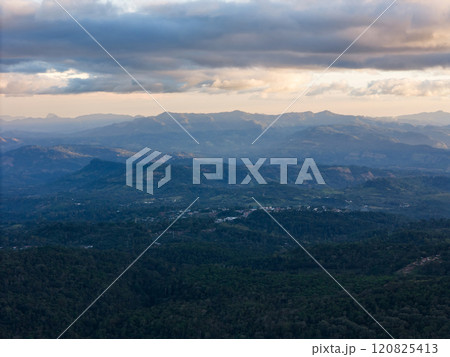 Stunning view of mountain landscape under dramatic sky at sunset in remote area 120825413