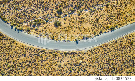 Aerial Desert Road Curve in Arid Nevada Landscape Aerial Desert Road Curve in Arid Nevada Landscape 120825578