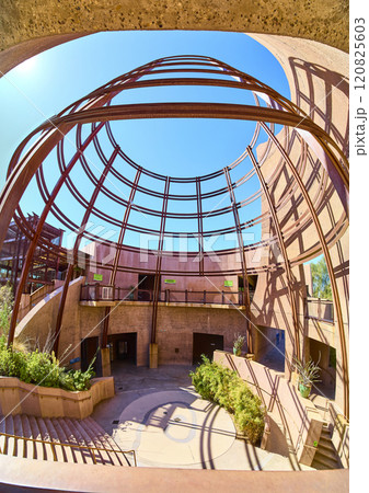 Circular Metal Lattice Dome with Sunlit Shadows Eye-Level View 120825603