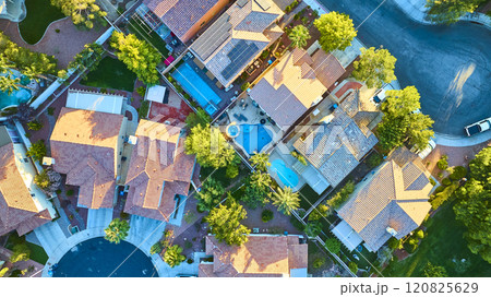 Aerial of Eco-Friendly Suburban Neighborhood at Golden Hour Aerial of Eco-Friendly Suburban Neighborhood at Golden Hour 120825629