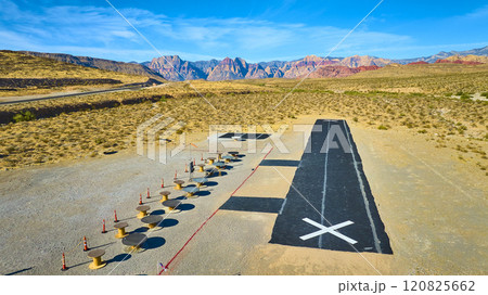 Aerial of Desert Runway and Construction Spools in Nevada 120825662