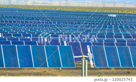 Aerial of Nevada Solar Farm in Arid Desert Landscape 120825741