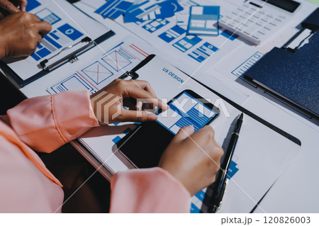 Young Asian business creative team work together, mobile application software design project. Brainstorm meeting, internet technology, smartphone web app designer, office coworker teamwork concept 120826003