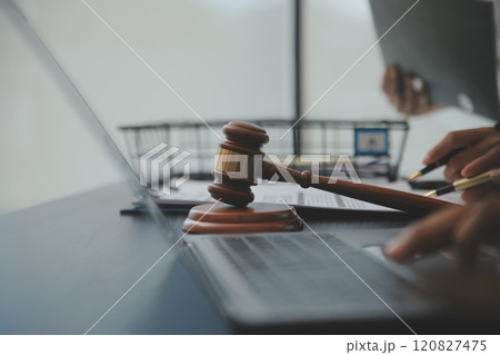 Law theme, gavel or mallet of the judge, lawyer enforcement officers, evidence-based cases taken into account in the court abount business, legislation. 120827475