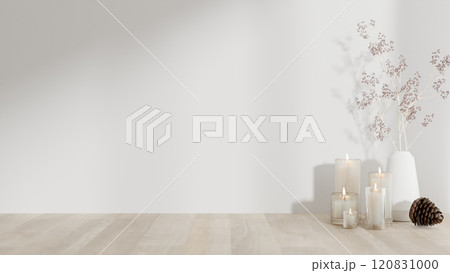 A minimalist wooden surface with lit candles and a ceramic flower vase against a white wall. A minimalist wooden surface with lit candles and a ceramic flower vase against a white wall. 120831000