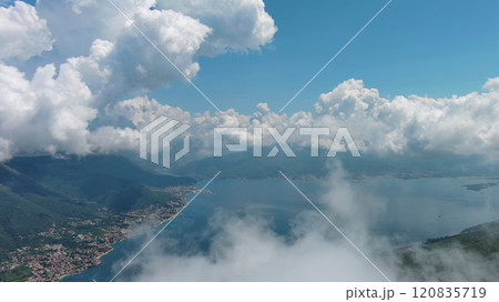 Aerial view on clouds over Kotor Bay Aerial view on clouds over Kotor Bay 120835719