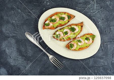 Baked, Stuffed Sweet Potatoes. 120837098