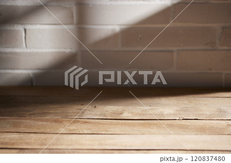 Various objects and vintage brick background with shadows of sunlight coming through the window. Various objects and vintage brick background with shadows of sunlight coming through the window. 120837480