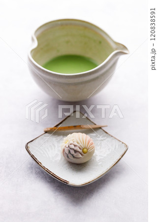 a cup of mathca and japanese confectionery 120838591