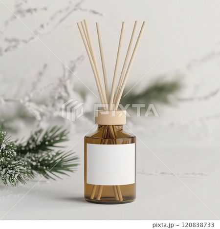 A beautiful reed diffuser bottle, complete with sticks and a white label. Diffuser white blank label mockup 120838733
