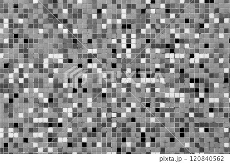 Monochrome mosaic wall with black, white and gray small tiles. Symmetrical design for abstract backgrounds or architectural details 120840562
