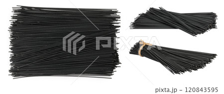 uncooked black spaghetti isolated on white background. Top view. Flat lay 120843595