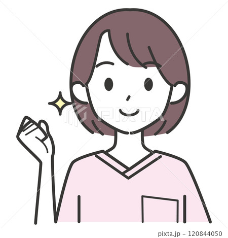 ガッツポーズをする看護師の女性 120844050