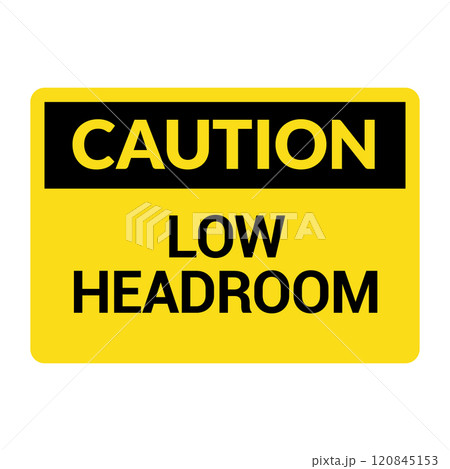 Caution low headroom warning sign in yellow and black. Safety signage for low clearance areas with 120845153