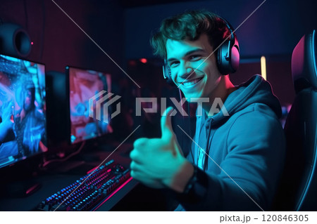 Smiling game streamer gives the finger up to his viewers.Game streaming concept. Generative AI Smiling game streamer gives the finger up to his viewers.Game streaming concept. Generative AI 120846305