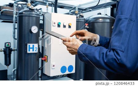 Engineer with tablet computer on Green Hydrogen factory Engineer with tablet computer on Green Hydrogen factory 120846433