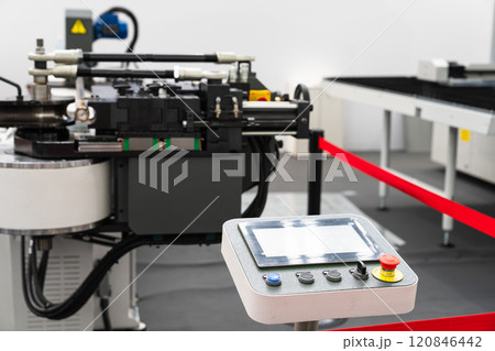 CNC mashine. Motorized maneuverable tool is controlled by a computer. Smart factory CNC mashine. Motorized maneuverable tool is controlled by a computer. Smart factory 120846442