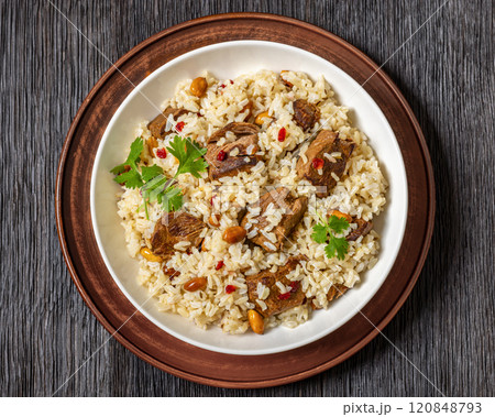 beef and rice in white bowl, top view 120848793