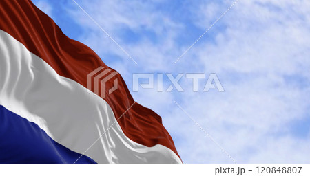 The national flag of the Netherlands waving in the wind on a sunny day The national flag of the Netherlands waving in the wind on a sunny day 120848807
