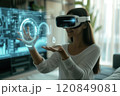 Woman Interacting with Virtual Holographic Interface 120849081