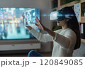 Woman Using VR Headset with Augmented Reality Interface 120849085