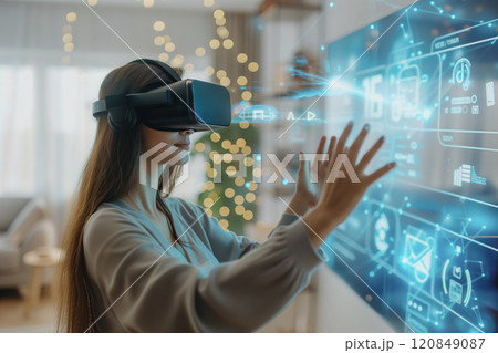 Woman Using VR Headset with Holographic Interface 120849087
