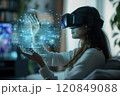 Woman Interacting with Holographic Data in VR 120849088