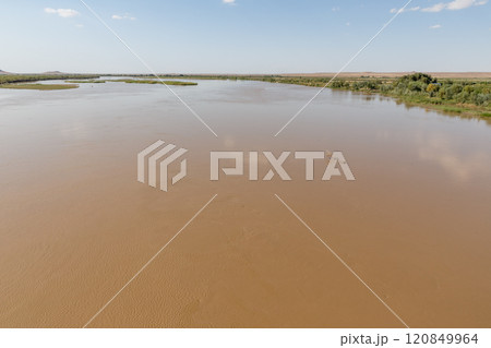 Amu Darya River flows peacefully near Kipchak village in Karakalpakstan Uzbekistan Amu Darya River flows peacefully near Kipchak village in Karakalpakstan Uzbekistan 120849964