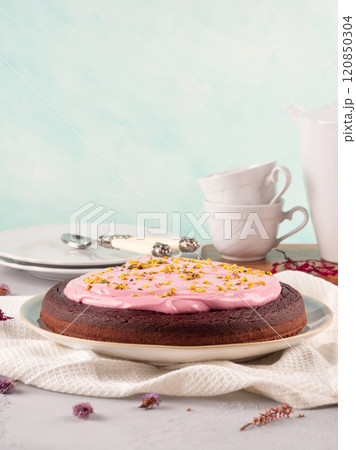 Beetroot chocolate cake with pink cream cheese pistachio icing Beetroot chocolate cake with pink cream cheese pistachio icing 120850304