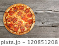 pizza on wooden background 120851208