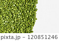 Green split peas background with one white  half 120851246