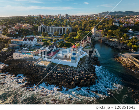 Aerial view of Santa Marta lighthouse and Cascais marina with Cascais cityscape Aerial view of Santa Marta lighthouse and Cascais marina with Cascais cityscape 120851643