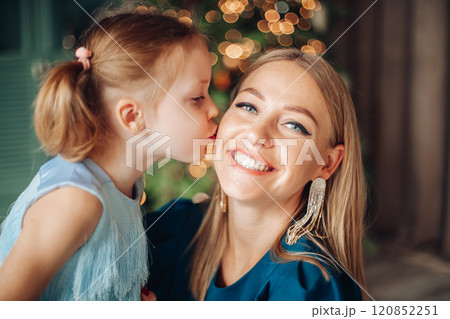 Little girl and her mom on Christmas morning at Little girl and her mom on Christmas morning at 120852251