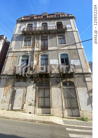 Lisbon, Portugal, facade of colorful old houses with windows, European historical buildings, cozy cityscape, Portuguese streets landscape 120852284