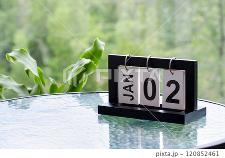 2 January calendar table with blurred nature background. With customizable space for text or ideas 2 January calendar table with blurred nature background. With customizable space for text or ideas 120852461
