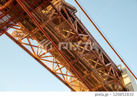 Lisbon, Portugal, Ponte 25 de Abril Bridge metal structure, modern architecture 120852810