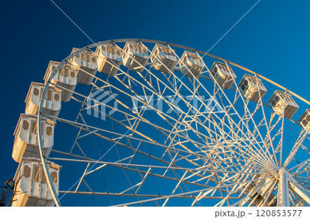 Ferris Wheel over blue sky, Lisbon, Portugal 120853577