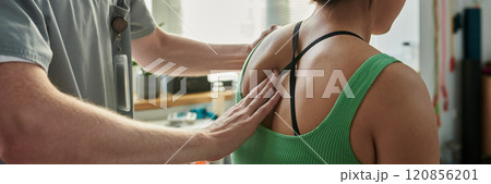 Conducting Medical Examination on Young Patient in Clinic 120856201