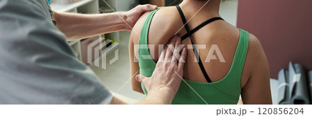 Receiving Physical Therapy Treatment from Therapist 120856204