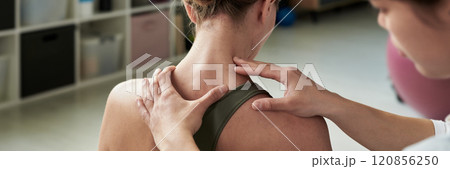 Providing Therapeutic Neck Massage in Calming Environment 120856250